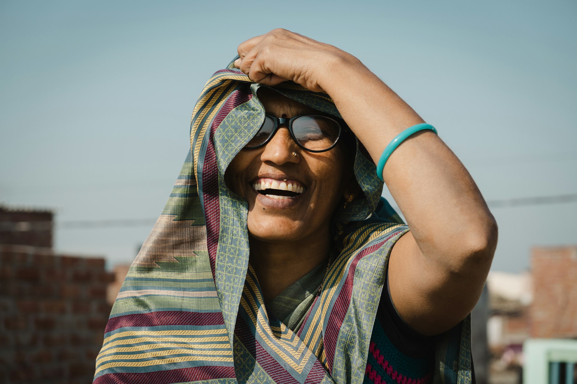 A woman with a scarf around her head